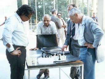 Serre playing Chess in Bombay